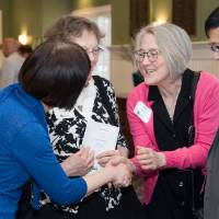 shaking hands with friends